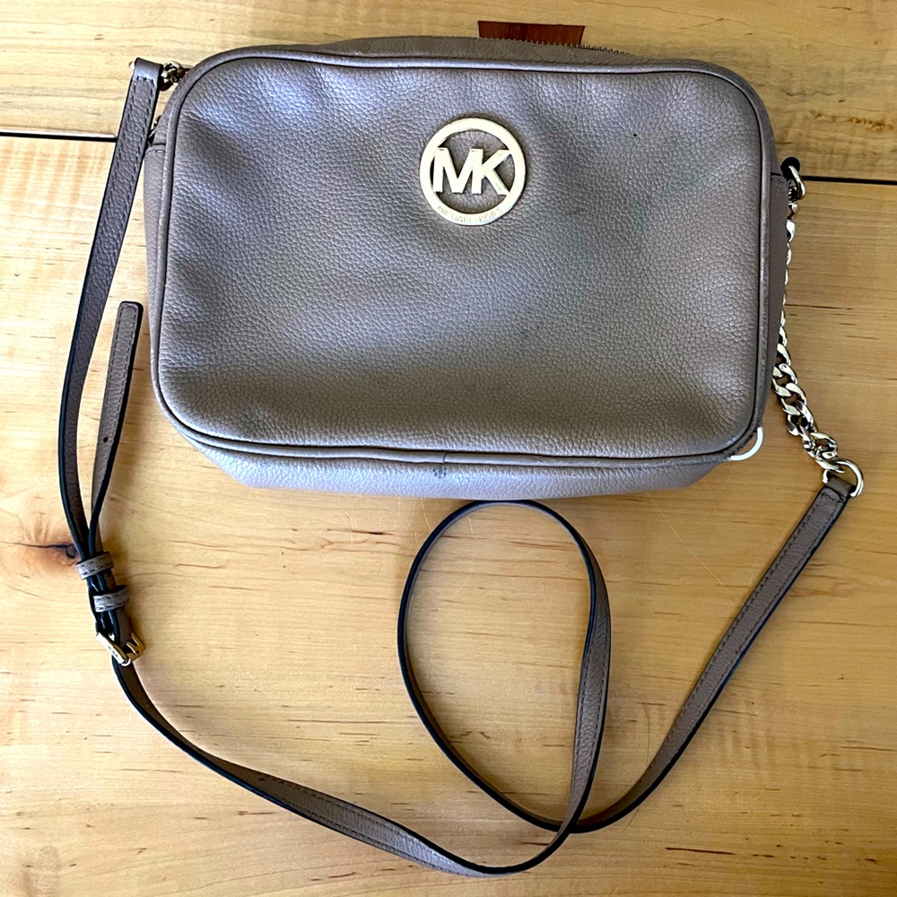Michael Kors brown/tan cross body sling bag with chain Adjustable strap.